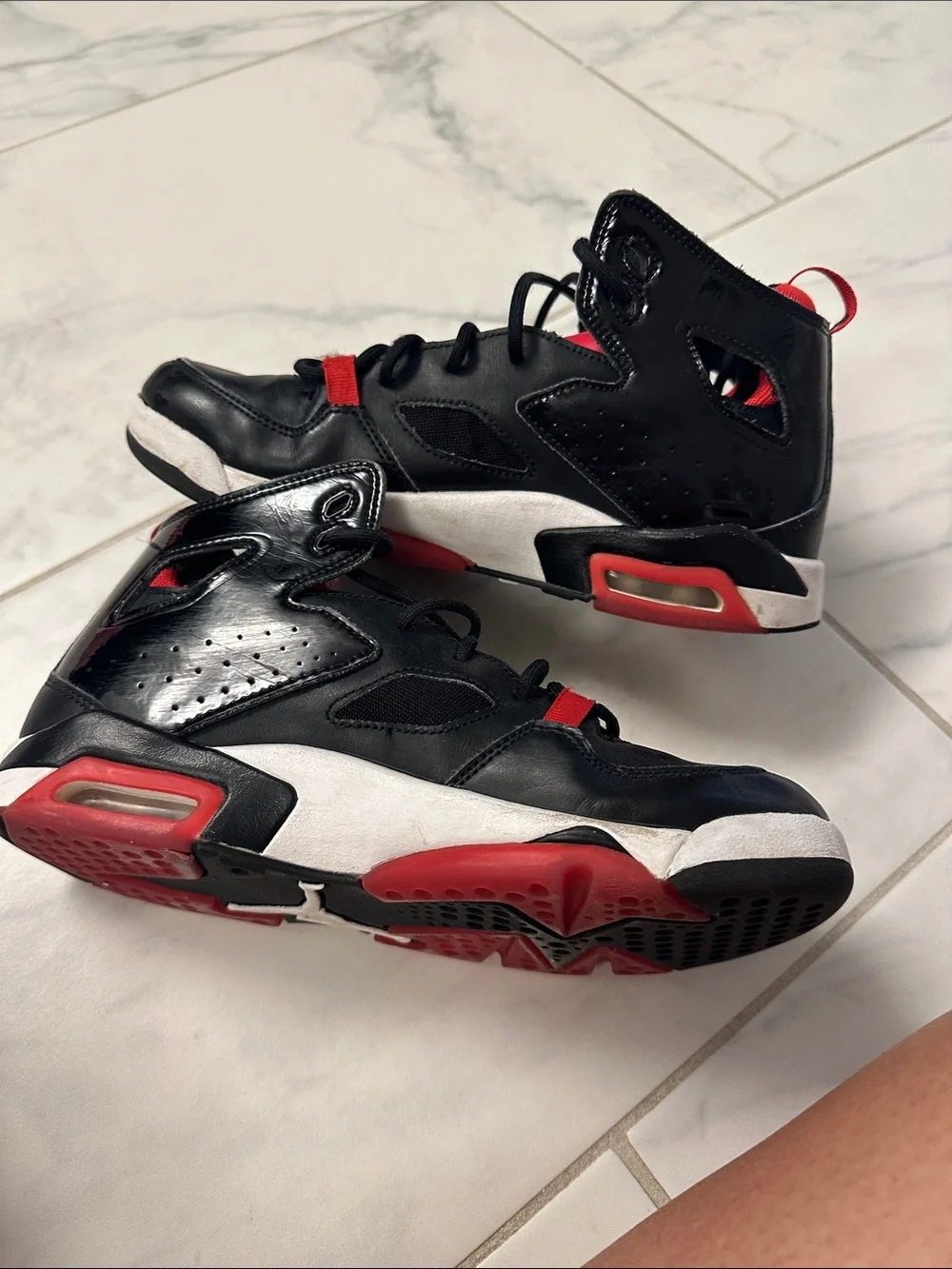Jordan youth size 6y Black and Red High-Top Sneakers